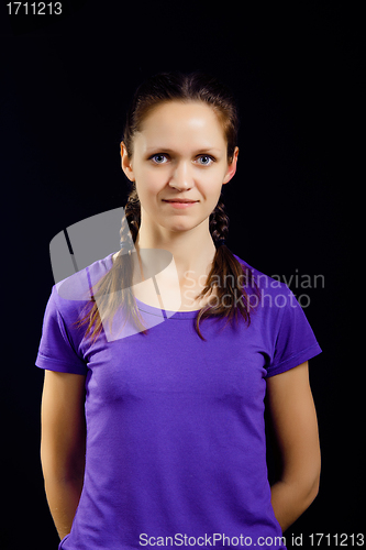 Image of girl with pigtails in a T-shirt