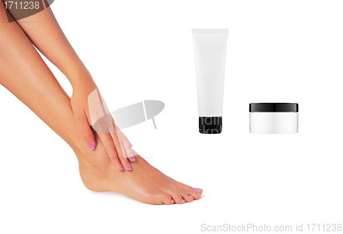 Image of two bottles of cream and a beautiful leg women