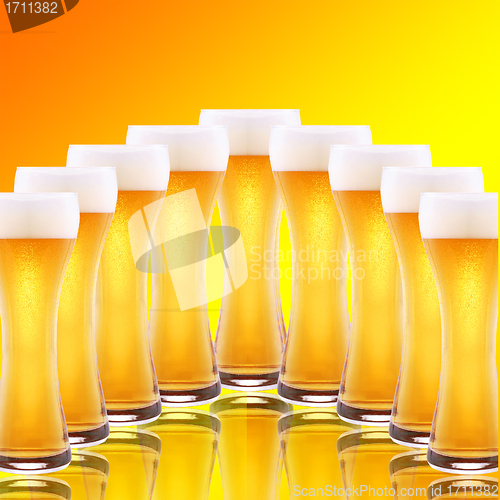Image of A row of beer pints