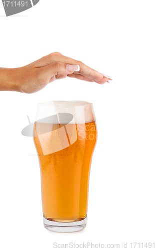 Image of hand reject a glass of beer - concept stop alcoholism