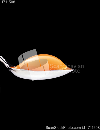 Image of yolk in the spoon