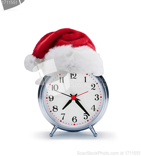 Image of alarm clock with christmas santa hat