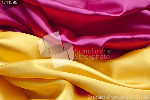 Image of Silk background in pink and yellow colors