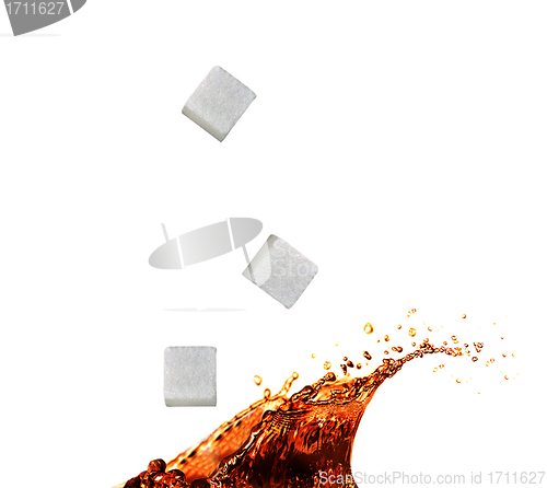 Image of Tea splash with sugar cube