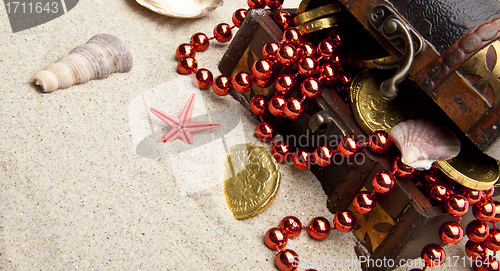 Image of golden coins with marine treasures