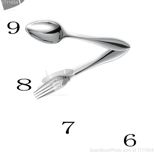 Image of Clock made of spoon and fork isolated
