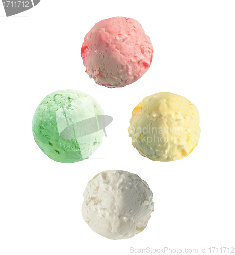 Image of Four isolated scoops of ice cream from side