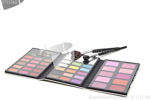 Image of Makeup brushes and make-up eye shadows