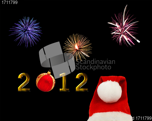 Image of Christmas themed 2012 with christmas bauble and santa claus hat