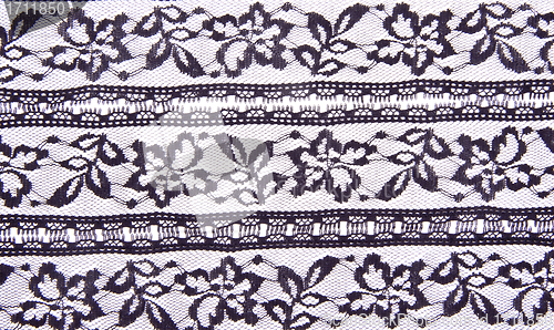 Image of White textile background with stylized flowers pattern