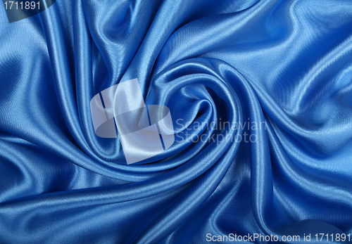 Image of Smooth elegant blue silk as background 