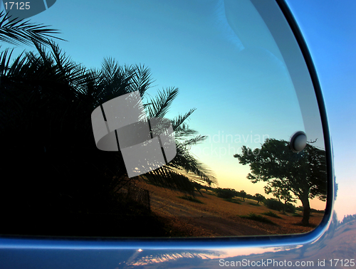 Image of Sunset reflection in a car back window