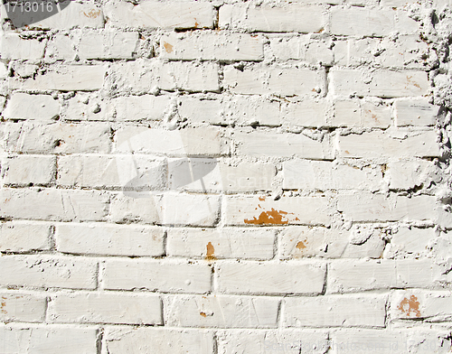 Image of Background red brick wall painted white paint 