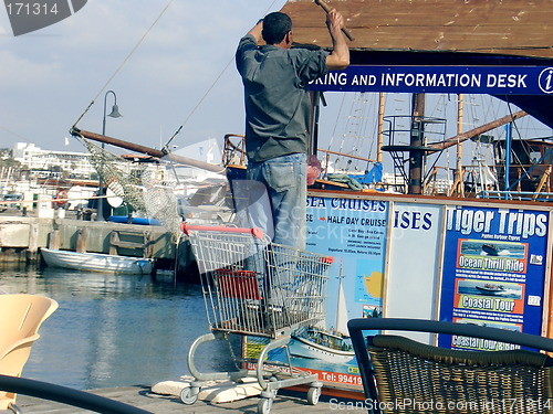 Image of shopping trolley as ladder