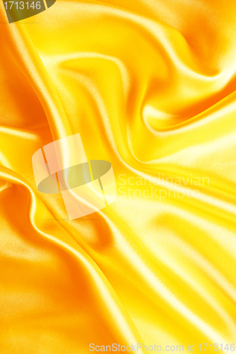 Image of Smooth elegant golden silk as background 