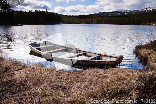 Image of boat filled with water