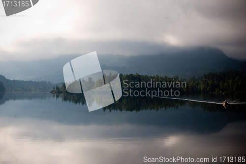 Image of Rowboat at dawn