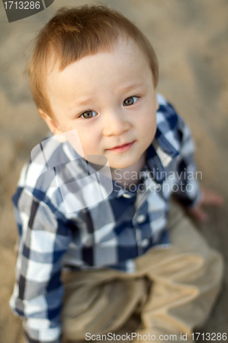 Image of Child Playing in the Sand