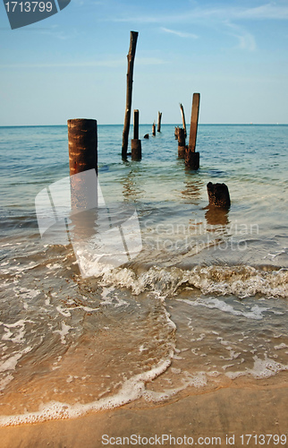 Image of old jetty pillars in sea