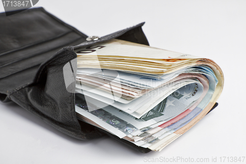 Image of many banknotes in wallet