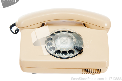 Image of Old analog phone with a disk, it is isolated on white