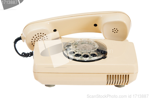 Image of Old analog phone with a disk, it is isolated on white