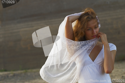 Image of Young woman with white scarf