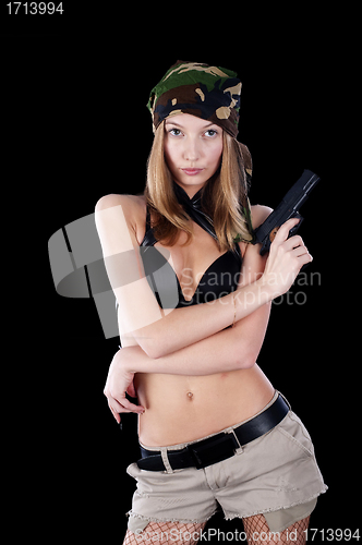 Image of Pretty woman with a gun