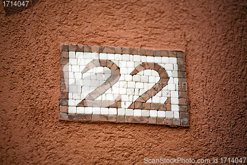 Image of mosaic door number