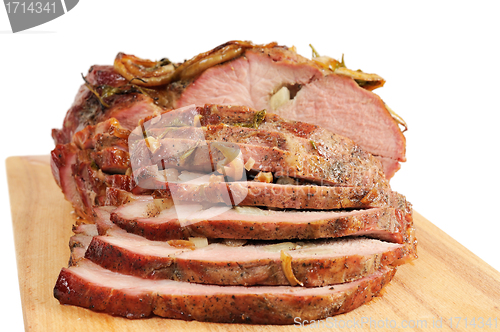 Image of Roast pork on a wooden board