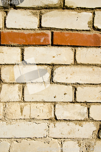 Image of Background of white brick wall  horizontal red row 