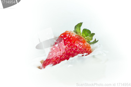 Image of strawberry splashing into milk