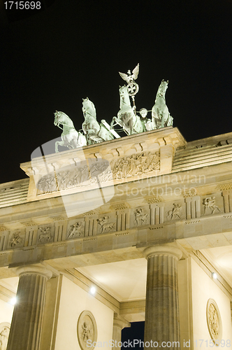 Image of Brandenburg Gate Berlin Germany Europe night  scene sculpture de