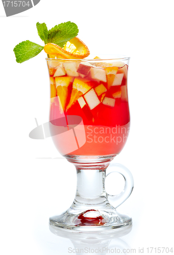 Image of glass of tea with fresh fruits and syrup