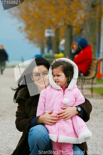 Image of Portrait of a young woman with a little girl 