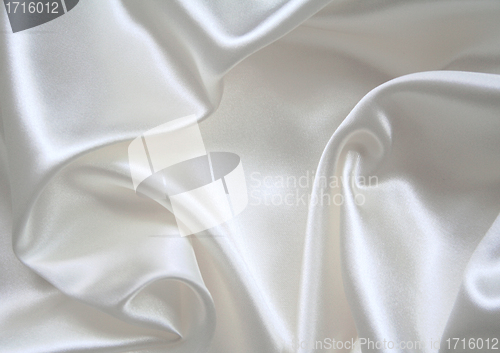 Image of Smooth elegant white silk as background 