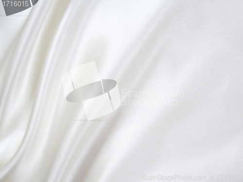 Image of Smooth elegant white silk as background 