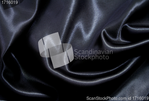 Image of Smooth elegant black silk as background 