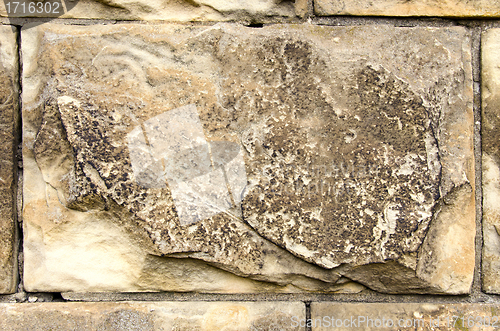 Image of background of ancient marble block wall closeup 