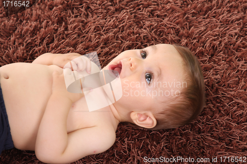 Image of happy baby boy, studio photo session