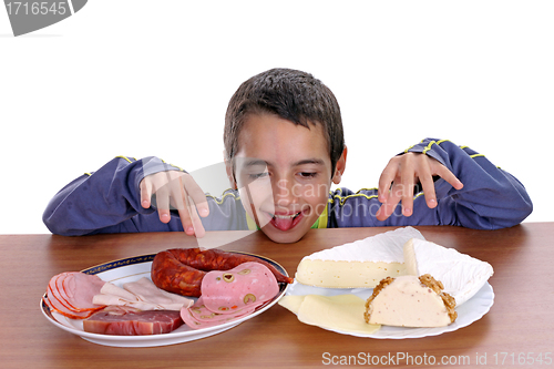 Image of hungry boy for cheese and sausage, food photo