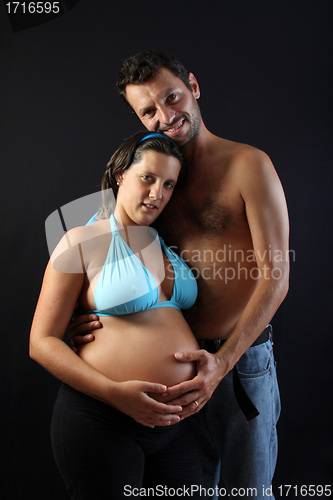 Image of beautiful and happy & young pregnant couple 