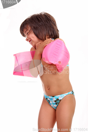 Image of beautiful girl in bikini, child studio photo