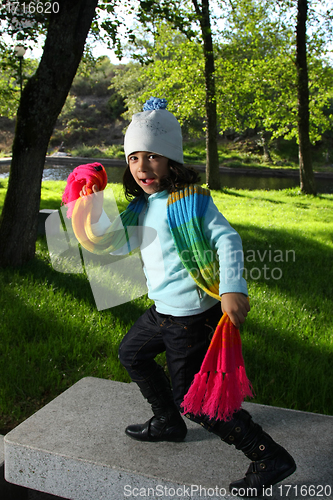 Image of Cute girl in autumn park