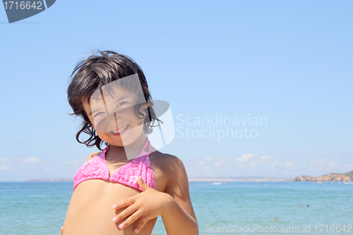 Image of beautiful girl in bikini in the beach, summer photo