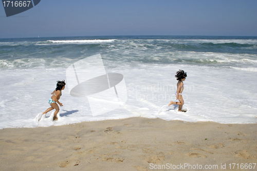 Image of beautiful girl in bikini in the beach, summer photo