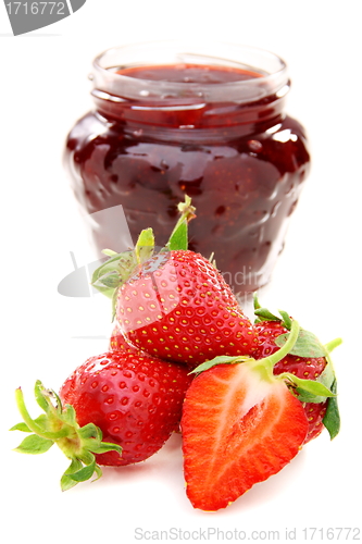 Image of Strawberry jam and fresh berries.