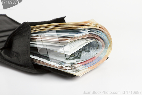 Image of many banknotes in wallet