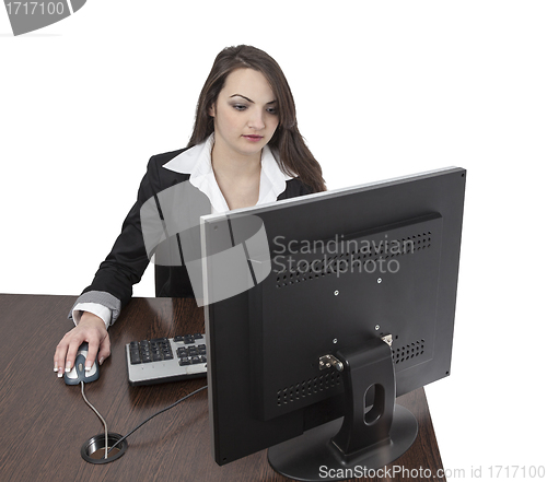 Image of Young woman working on a computer