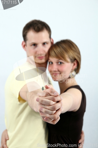 Image of Young couple ballroom dancing